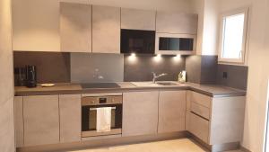 Kuchyň nebo kuchyňský kout v ubytování Appartement IRE