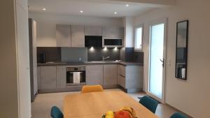 Kuchyň nebo kuchyňský kout v ubytování Appartement IRE