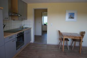 Kuchyň nebo kuchyňský kout v ubytování Ferienwohnung Woelfel