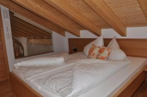 Tempat tidur dalam kamar di 4 Jahreszeiten