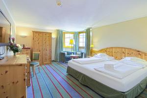 Katil atau katil-katil dalam bilik di Hotel Kaiserhof Kitzbühel, 4 Sterne Superior