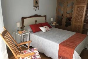 Posteľ alebo postele v izbe v ubytovaní cuartin del camino