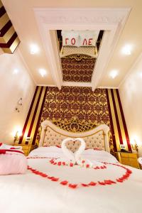 Posteľ alebo postele v izbe v ubytovaní Erossuite GuestHouse