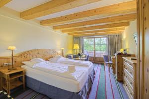 Katil atau katil-katil dalam bilik di Hotel Kaiserhof Kitzbühel, 4 Sterne Superior