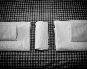 a group of towels sitting on a table at The Walhampton Arms in Lymington