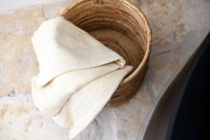 a towel is sitting in a basket on a counter at Arya Nobile Dimora in Carovigno