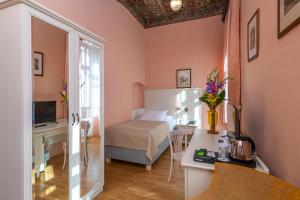 Postel nebo postele na pokoji v ubytování Hotel Cerny Slon + 37 fotografií