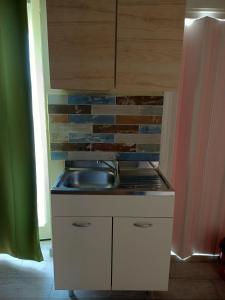 Η κουζίνα ή μικρή κουζίνα στο Sole&Scudo +11 φωτογραφίες