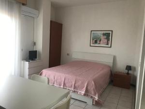 Postel nebo postele na pokoji v ubytování Il Lauro