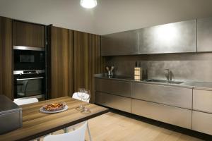 Kuchyň nebo kuchyňský kout v ubytování MAMELI SUITE by IDEA MONFERRATO sas + 30 fotografií