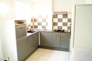 Kuchyň nebo kuchyňský kout v ubytování Gite One Luchon appartement 6 personnes