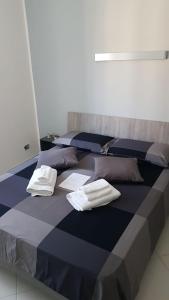 Postel nebo postele na pokoji v ubytování B&b regina del porto