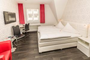 TV a/nebo společenská místnost v ubytování Hotel Linde