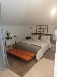 Cama o camas de una habitación en Porto Suites do Marquês