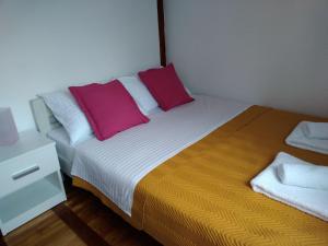 Postelja oz. postelje v sobi nastanitve Sweet Apartment