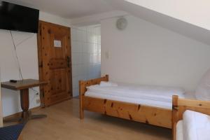 Voodi või voodid majutusasutuse Hotel Franziskaner toas