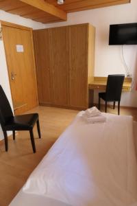 Voodi või voodid majutusasutuse Hotel Franziskaner toas