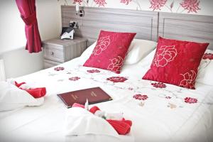 Postel nebo postele na pokoji v ubytování Hambledon Hotel