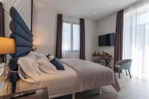 Posteľ alebo postele v izbe v ubytovaní Abba San Sebastián Hotel