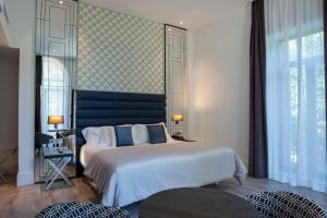 Posteľ alebo postele v izbe v ubytovaní Abba San Sebastián Hotel