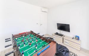 Televízia a/alebo spoločenská miestnosť v ubytovaní Luxury Dream House