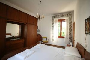 Posteľ alebo postele v izbe v ubytovaní Al Sasso, Barga
