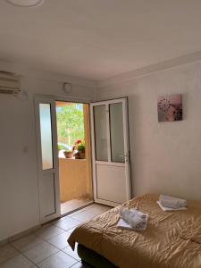 Postel nebo postele na pokoji v ubytování Apartments Boss