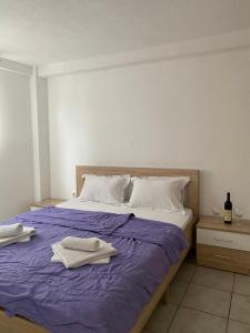 Postel nebo postele na pokoji v ubytování Apartments Boss