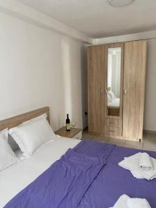 Postel nebo postele na pokoji v ubytování Apartments Boss