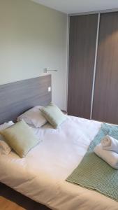 Postel nebo postele na pokoji v ubytování Appartement Laudon