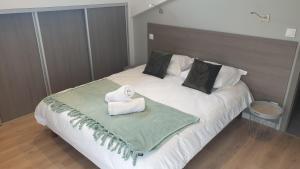 Postel nebo postele na pokoji v ubytování Appartement Laudon