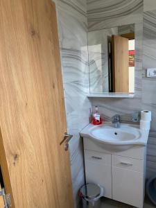 Koupelna v ubytování Apartments Boss