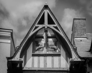 a window on the top of a building at L'Oisellerie Meublé de Tourisme in Angers
