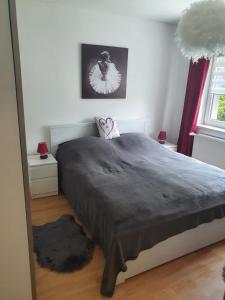 Un pat sau paturi într-o cameră la Anni's Waldblick