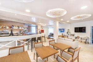 TV a/nebo společenská místnost v ubytování Hotel Stella Della Versilia
