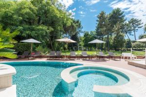 Bazén v ubytování Hotel Stella Della Versilia nebo v jeho okolí
