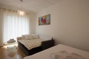 Postel nebo postele na pokoji v ubytování Küüni 5B Apartment
