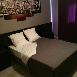 La Clé des Champs tesisinde bir odada yatak veya yataklar