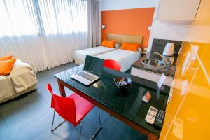 Postel nebo postele na pokoji v ubytování Roberta Rosa De Fontana Suites