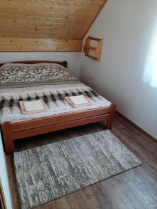 Letto o letti in una camera di Apartman Šumska Tajna