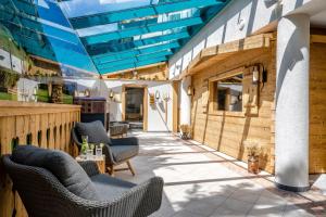 Posezení v ubytování Boutique Hotel Erb München Parsdorf