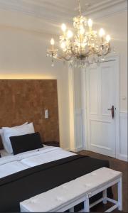 Cama o camas de una habitación en Hotel Belle-Vie