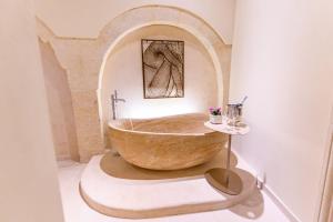 Koupelna v ubytování Pollicastro Boutique Hotel