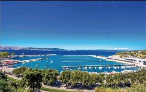 a view of a marina with boats in the water at Villa deluxe "H" - private jacuzzi in Novi Vinodolski