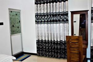 Postel nebo postele na pokoji v ubytování Sky White Villa