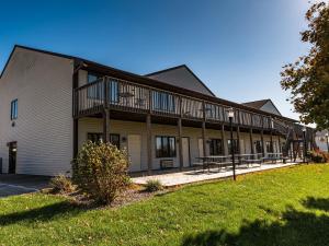 a building with balconies on the side of it at Lake Panorama National Resort in Panora