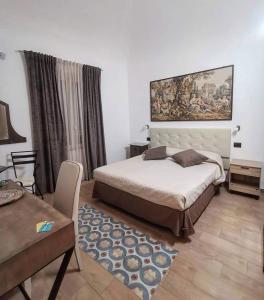 A bed or beds in a room at La corte di Angelica