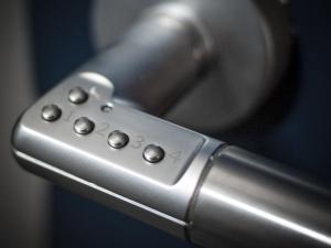 a close up of a silver remote control at Marischal Apartments in Aberdeen