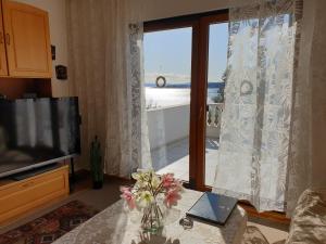 TV a/nebo společenská místnost v ubytování Corinna Zavala Resort