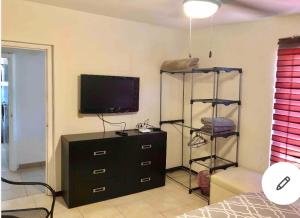 TV a/nebo společenská místnost v ubytování Agradable* y Cómodo Departamento Familiar (WiFi)